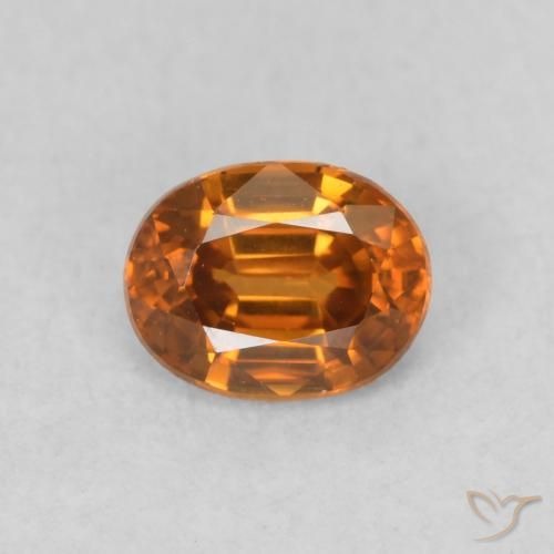 0.60ct Naturale Arancione scuro Zircone, Ovale, VVS-VS