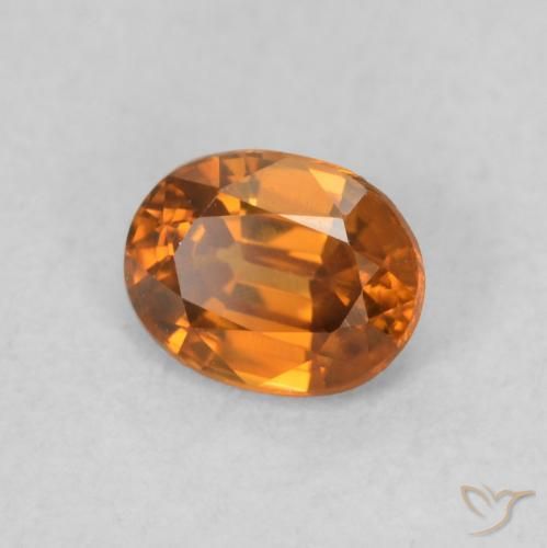 Zircone Arancione scuro naturale da 0.60 ct, Ovale, VVS-VS