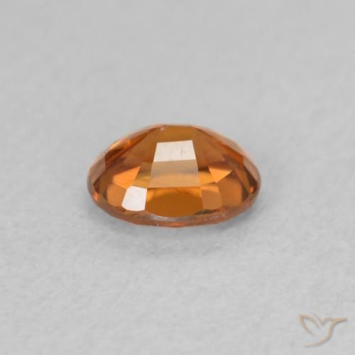 Zircone Arancione scuro naturale da 0.60 ct, Ovale, VS