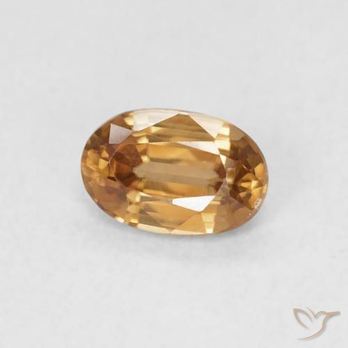 Zircone Arancione marroncino naturale da 0.74 ct, Ovale, VVS-VS