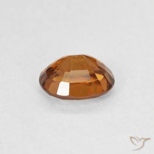 Zircone Arancione scuro naturale da 0.61 ct, Ovale, VS