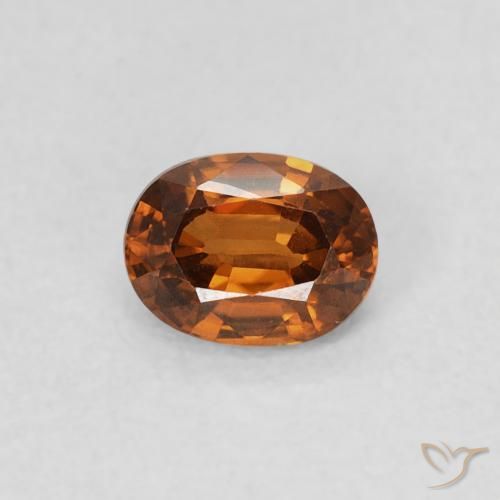 0.60ct Naturale Medium Dark-Orange Zircone, Ovale, VS
