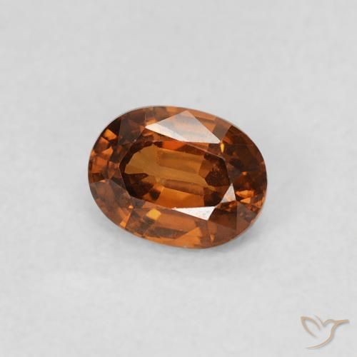 Zircone Medium Dark-Orange naturale da 0.60 ct, Ovale, VS
