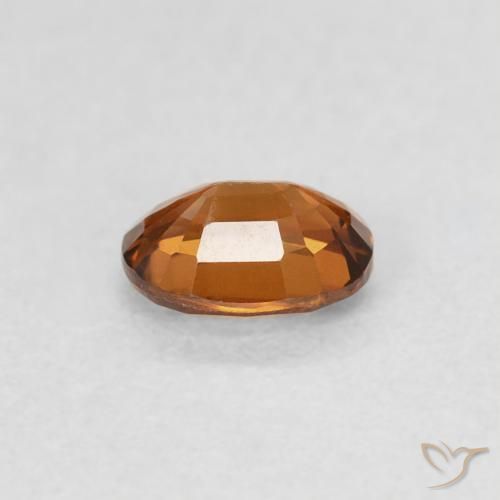 Zircone Medium Dark-Orange naturale da 0.60 ct, Ovale, VS