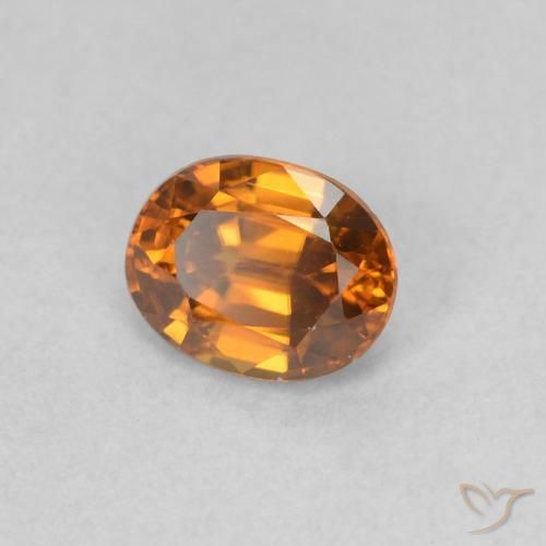 Zircone Medium Dark-Orange naturale da 0.62 ct, Ovale, VVS