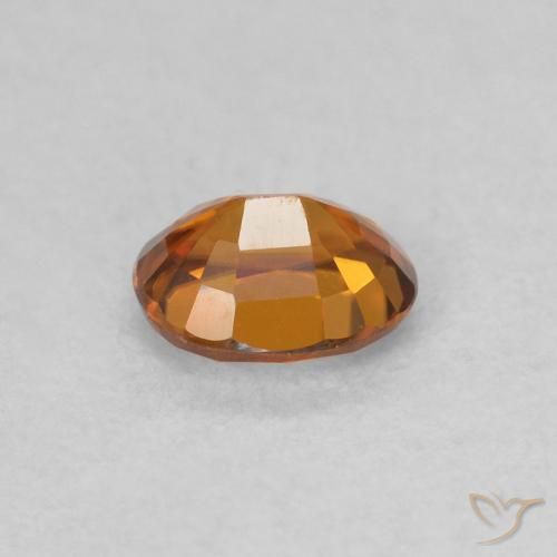 Zircone Medium Dark-Orange naturale da 0.62 ct, Ovale, VVS
