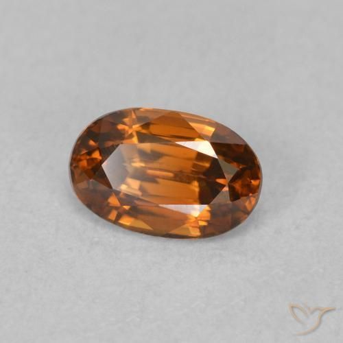 Zircone Medium Dark-Orange naturale da 0.78 ct, Ovale, VVS