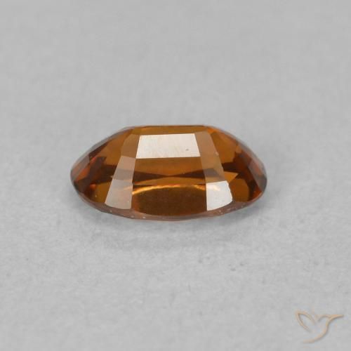 Zircone Medium Dark-Orange naturale da 0.78 ct, Ovale, VVS