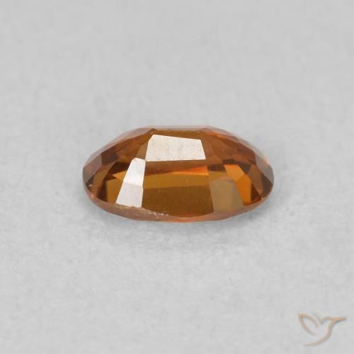 Zircone Medium Dark-Orange naturale da 0.73 ct, Ovale, VVS