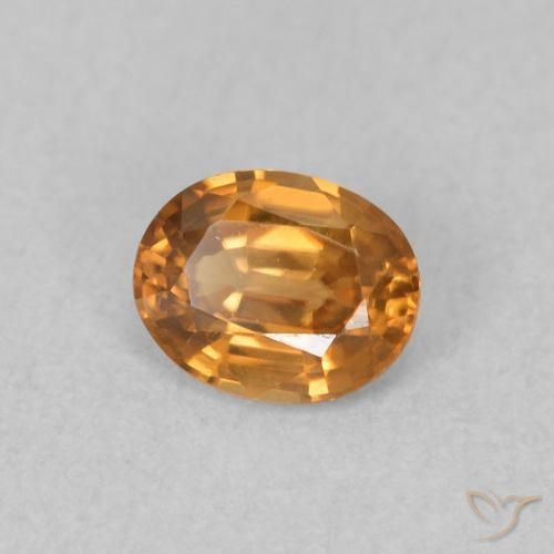 Zircone Marrone arancio naturale da 0.61 ct, Ovale, VVS
