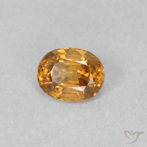 Zircone Arancione scuro naturale da 0.66 ct, Ovale, VVS