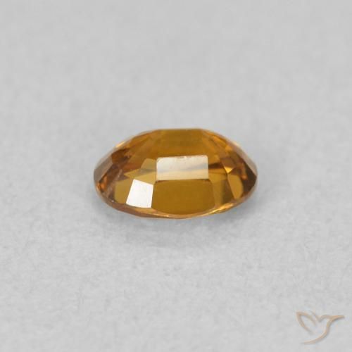 Zircone Arancione marroncino naturale da 0.59 ct, Ovale, VVS-VS