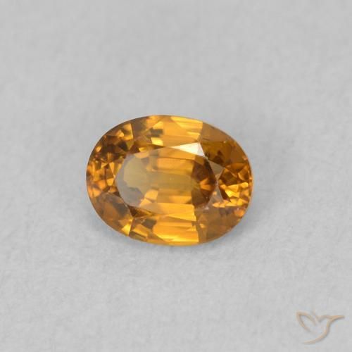 Zircone Arancione marroncino naturale da 0.63 ct, Ovale, VVS-VS