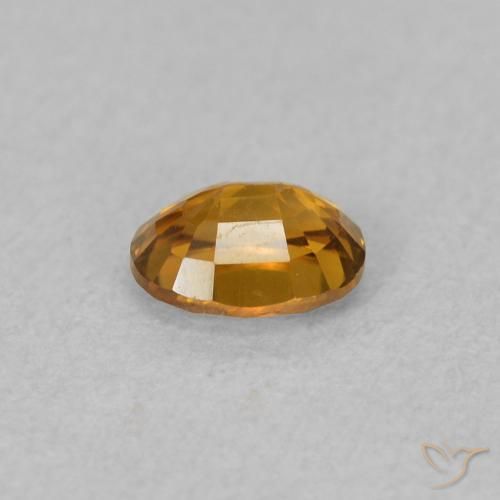 Zircone Arancione marroncino naturale da 0.63 ct, Ovale, VVS-VS