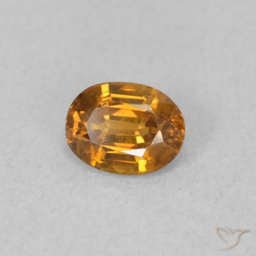 Zircone Arancione marroncino naturale da 0.58 ct, Ovale, VVS-VS