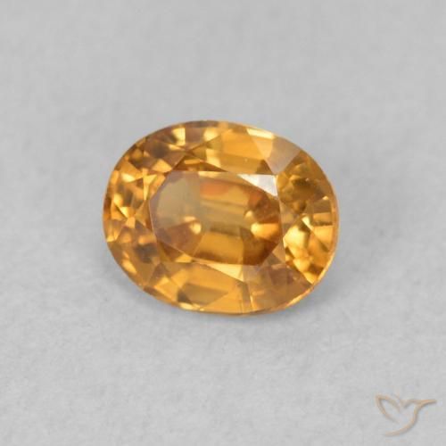Zircone Arancione scuro naturale da 0.62 ct, Ovale, VVS