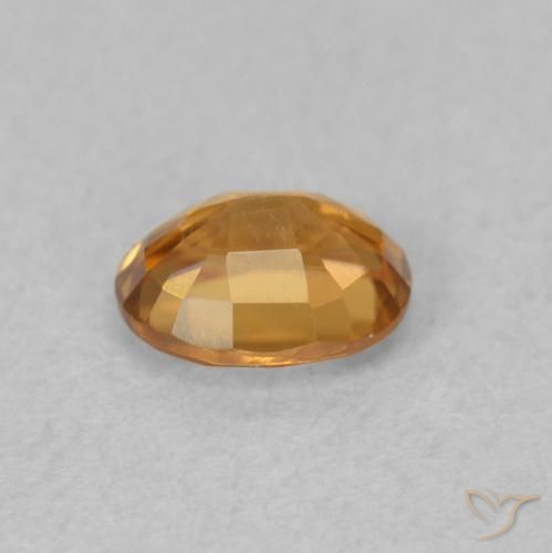 Zircone Arancione scuro naturale da 0.62 ct, Ovale, VVS