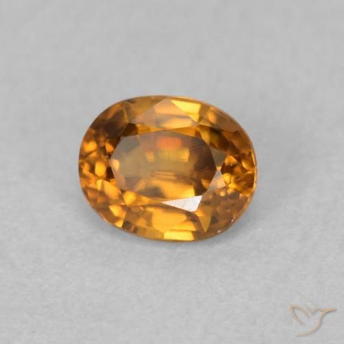Zircone Marrone arancio naturale da 0.64 ct, Ovale, VVS