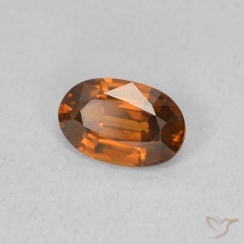 Zircone Arancione rossastra naturale da 0.64 ct, Ovale, VVS