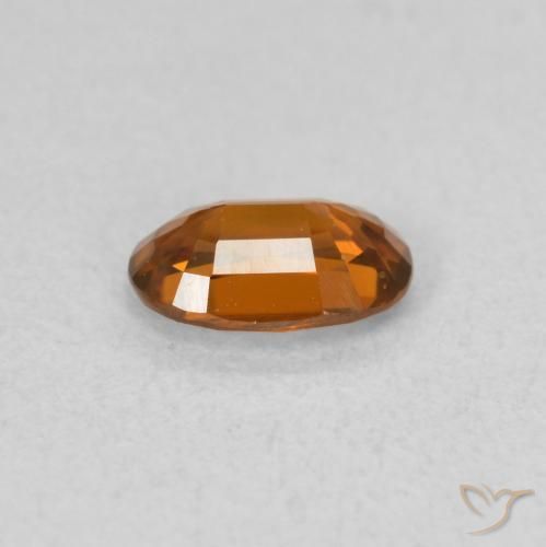 Zircone Arancione rossastra naturale da 0.64 ct, Ovale, VVS