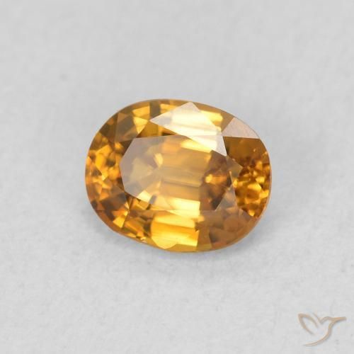 Zircone Arancione marroncino naturale da 0.65 ct, Ovale, VVS-VS