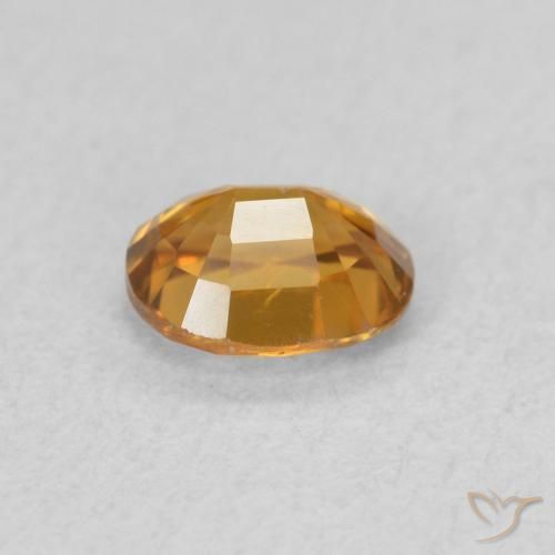 Zircone Arancione marroncino naturale da 0.65 ct, Ovale, VVS-VS