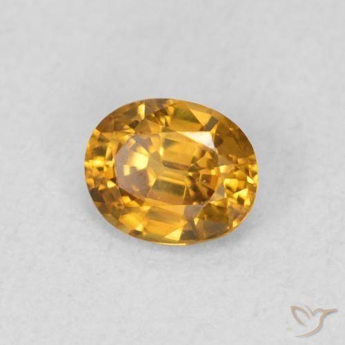 Zircone Dorato scuro naturale da 0.57 ct, Ovale, VVS