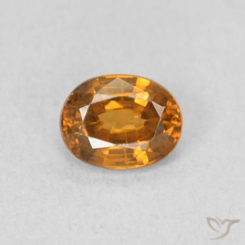 Zircone Arancio Terra naturale da 0.60 ct, Ovale, VS