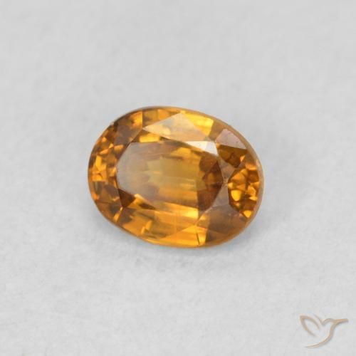 Zircone Arancio Terra naturale da 0.60 ct, Ovale, VS