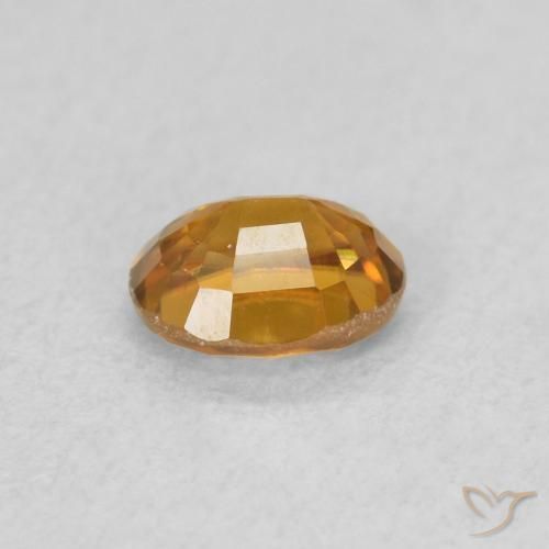 Zircone Arancio Terra naturale da 0.60 ct, Ovale, VS