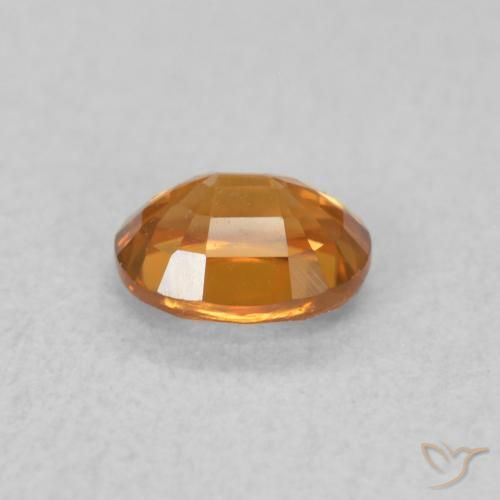 Zircone Arancione scuro naturale da 0.67 ct, Ovale, VVS