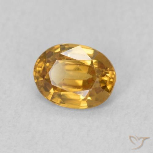 Zircone Arancione-Oro naturale da 0.57 ct, Ovale, VVS-VS
