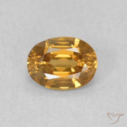Zircone Arancione-Oro naturale da 0.62 ct, Ovale, VVS