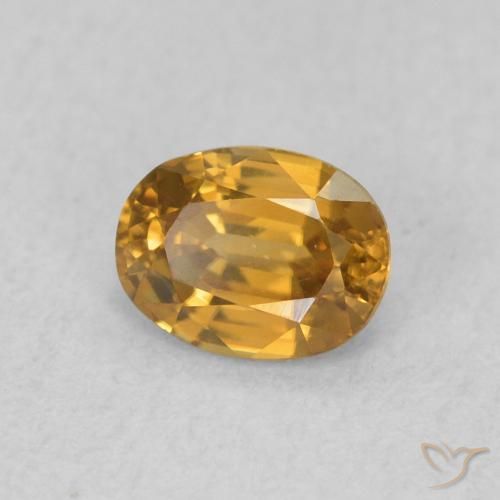 Zircone Arancione-Oro naturale da 0.62 ct, Ovale, VVS