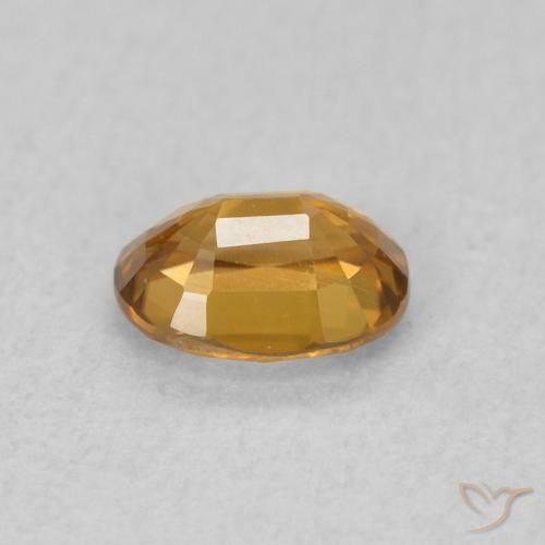 Zircone Arancione-Oro naturale da 0.62 ct, Ovale, VVS