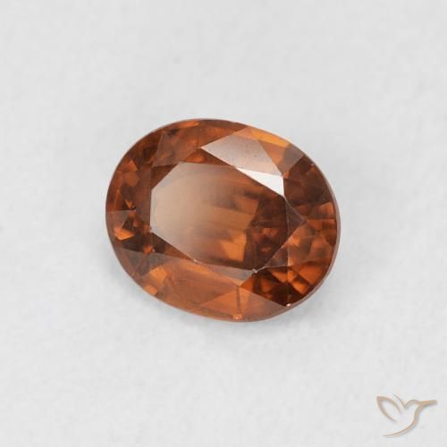 Zircone Arancione rossastra naturale da 0.94 ct, Ovale, VS