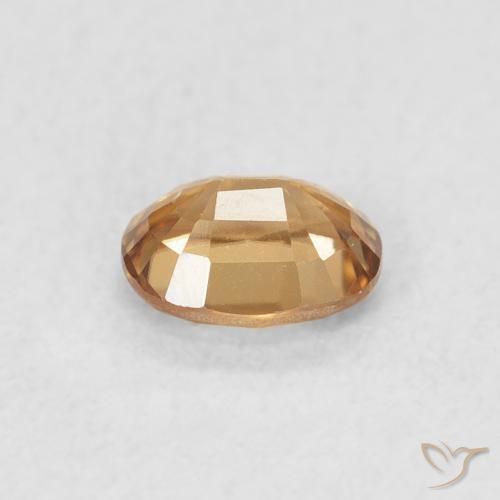 Zircone Golden-Peach naturale da 0.60 ct, Ovale, VVS