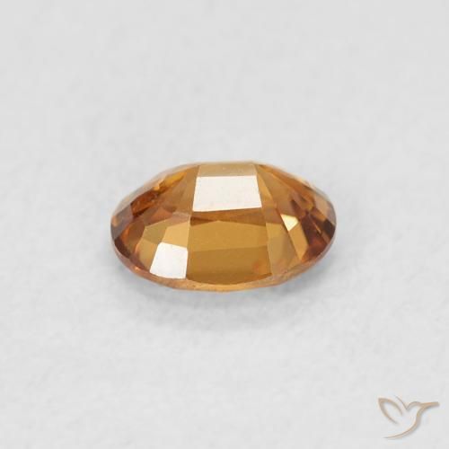 Zircone Arancione scuro naturale da 0.61 ct, Ovale, VVS