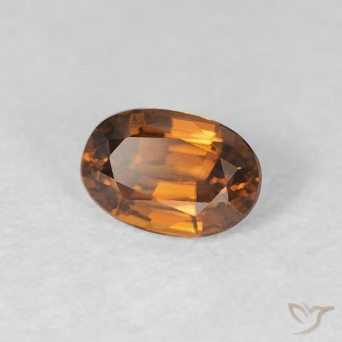 Zircone Arancione marroncino naturale da 0.86 ct, Ovale, VVS