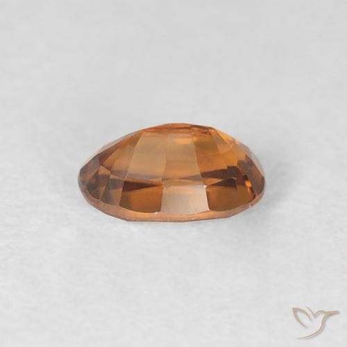 Zircone Arancione scuro naturale da 0.84 ct, Ovale, VVS-VS