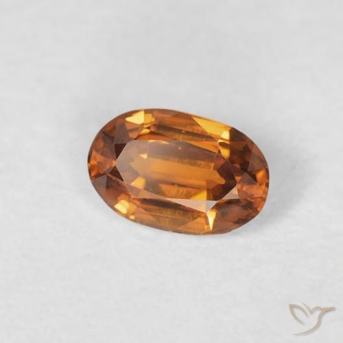 Zircone Medium Dark-Orange naturale da 0.71 ct, Ovale, VVS