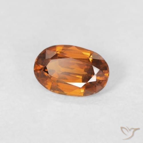 Zircone Medium Dark-Orange naturale da 0.68 ct, Ovale, VVS-VS