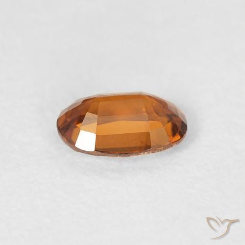 Zircone Medium Dark-Orange naturale da 0.68 ct, Ovale, VVS-VS