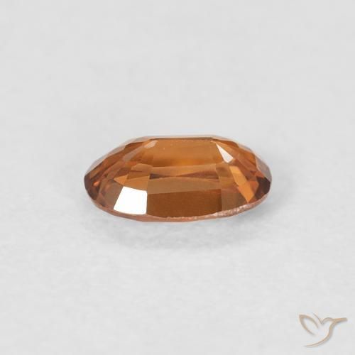 Zircone Arancione marroncino naturale da 0.66 ct, Ovale, VVS