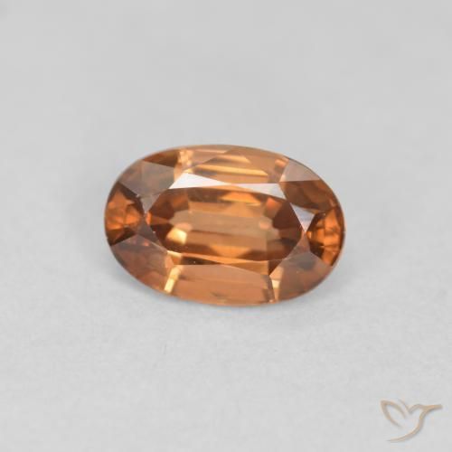 Zircone Arancione scuro naturale da 0.69 ct, Ovale, VVS-VS
