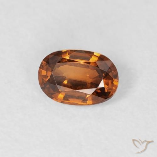 Zircone Arancione scuro naturale da 0.64 ct, Ovale, VVS