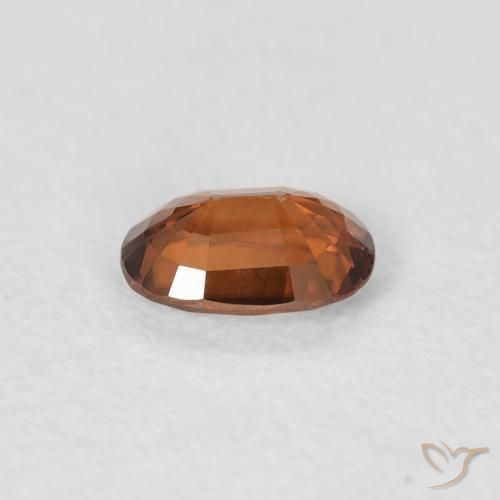 Zircone Arancione scuro naturale da 0.64 ct, Ovale, VVS