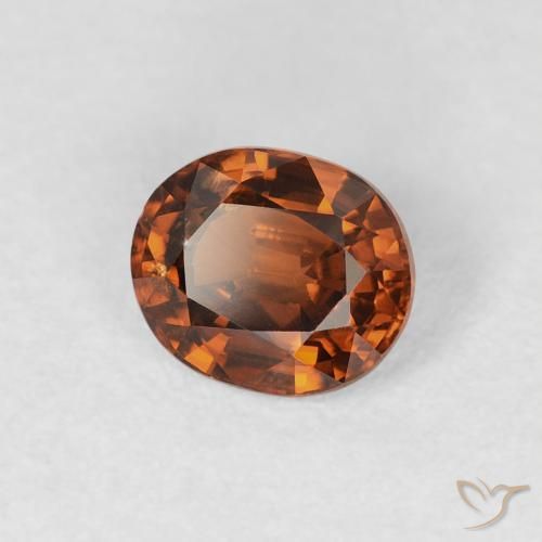 Zircone Arancio brunastro intenso naturale da 0.99 ct, Ovale, VS