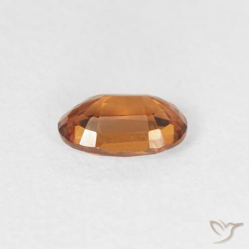 Zircone Arancione scuro naturale da 0.64 ct, Ovale, VVS