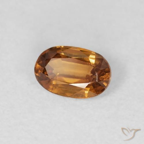 Zircone Arancione marroncino naturale da 0.70 ct, Ovale, VVS-VS